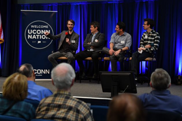 Zach Stone ‘04 (far left) discusses a concept with his fellow panelists (left to right), Horea Ilies, Ph.D, Michael Astrachan ’87, and Patrick Belanger ’16, ’18 MFA at the Jan. 2019 Science Salon. (Peter Morenus/UConn Photo)