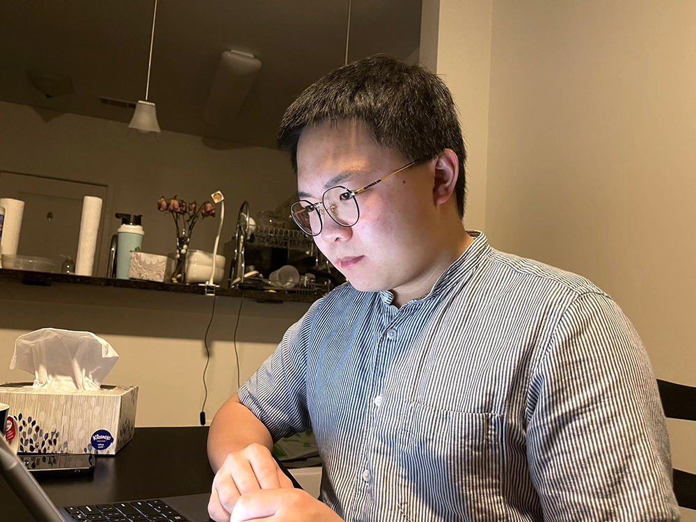 photo of Yinyu Wang (MSE’23) studies electrospinning nanofibers contributing to clean energy research as part of  Jasna Jankovic’s research group